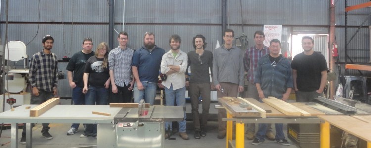 Intro to Woodworking Tools behind the tablesaws.  110 fingers.